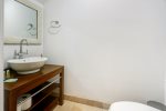 Convenient powder room situated across the dining area